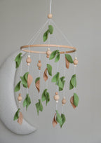 Forest style floral mobile with leaves and wooden pearls - Minidreams Decor