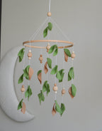 Forest style floral mobile with leaves and wooden pearls - Minidreams Decor