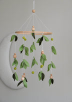 Forest style floral mobile with leaves and wooden pearls - Minidreams Decor