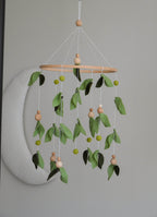 Forest style floral mobile with leaves and wooden pearls - Minidreams Decor