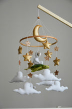Mobile with astronaut, golden stars and moon, space style - Minidreams Decor