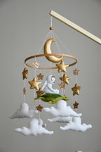 Mobile with astronaut, golden stars and moon, space style - Minidreams Decor